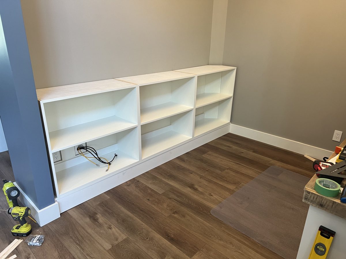 Base cabinets first in place