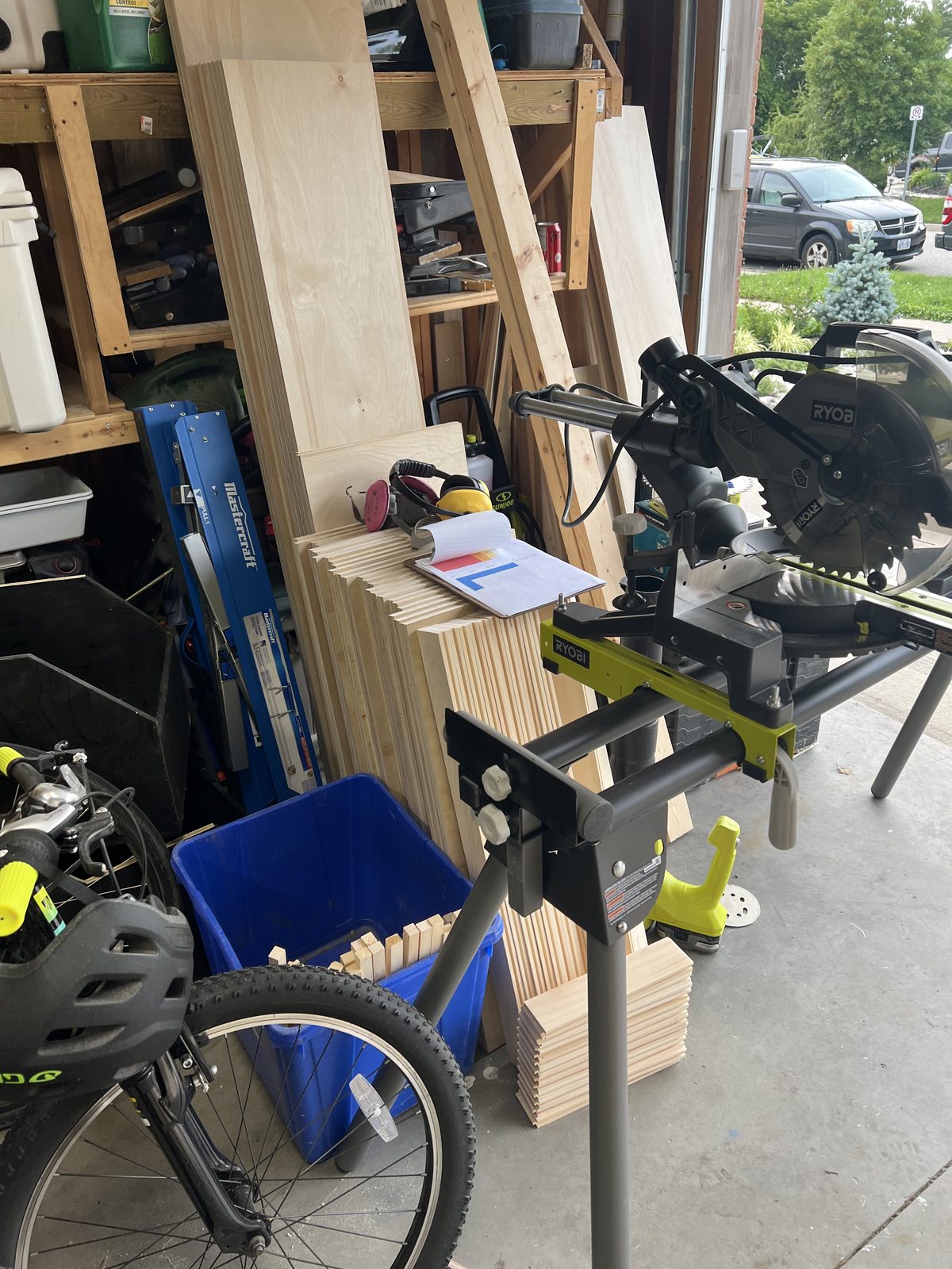 Cut pieces staged with plans on the wall